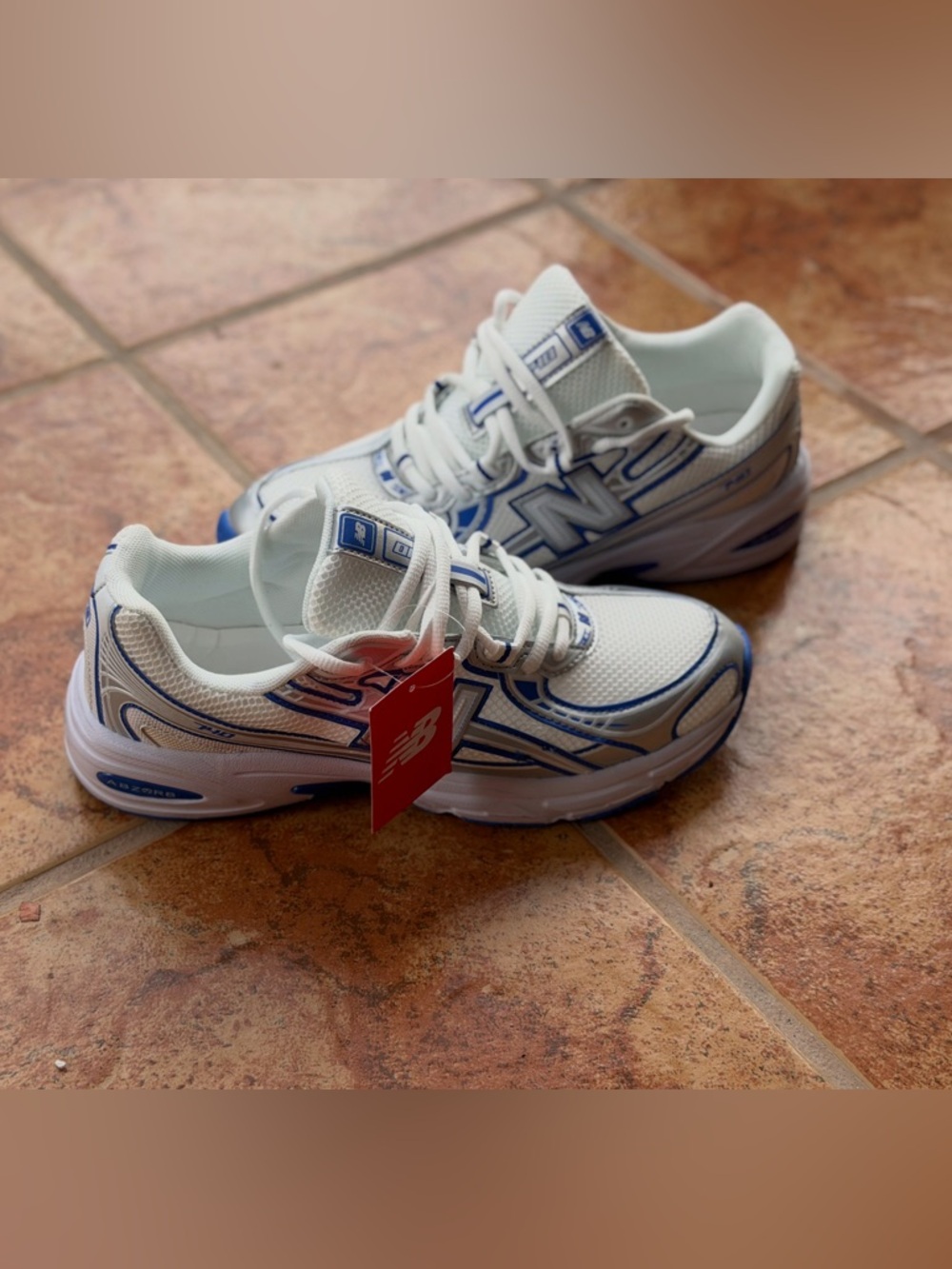 Size 9.5 Men’s And 11 Women’s-  New Balance 740 White and Blue Athletic